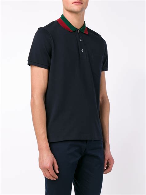 navy blue Gucci polo shirt